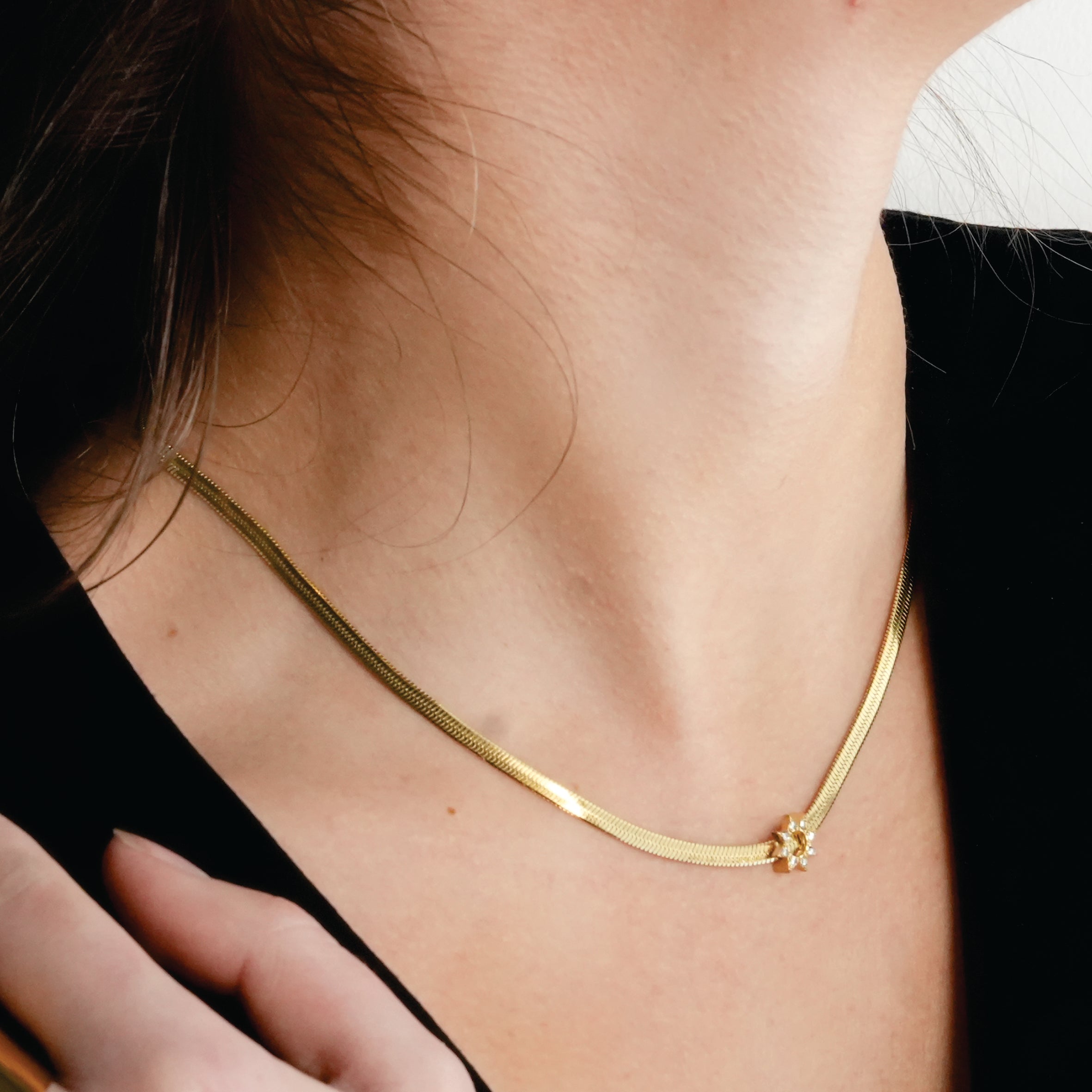 AGULHAS Gold: Celestial Elegance - Snake Skin Chain Necklace with Zirconia Embedded Star Charm