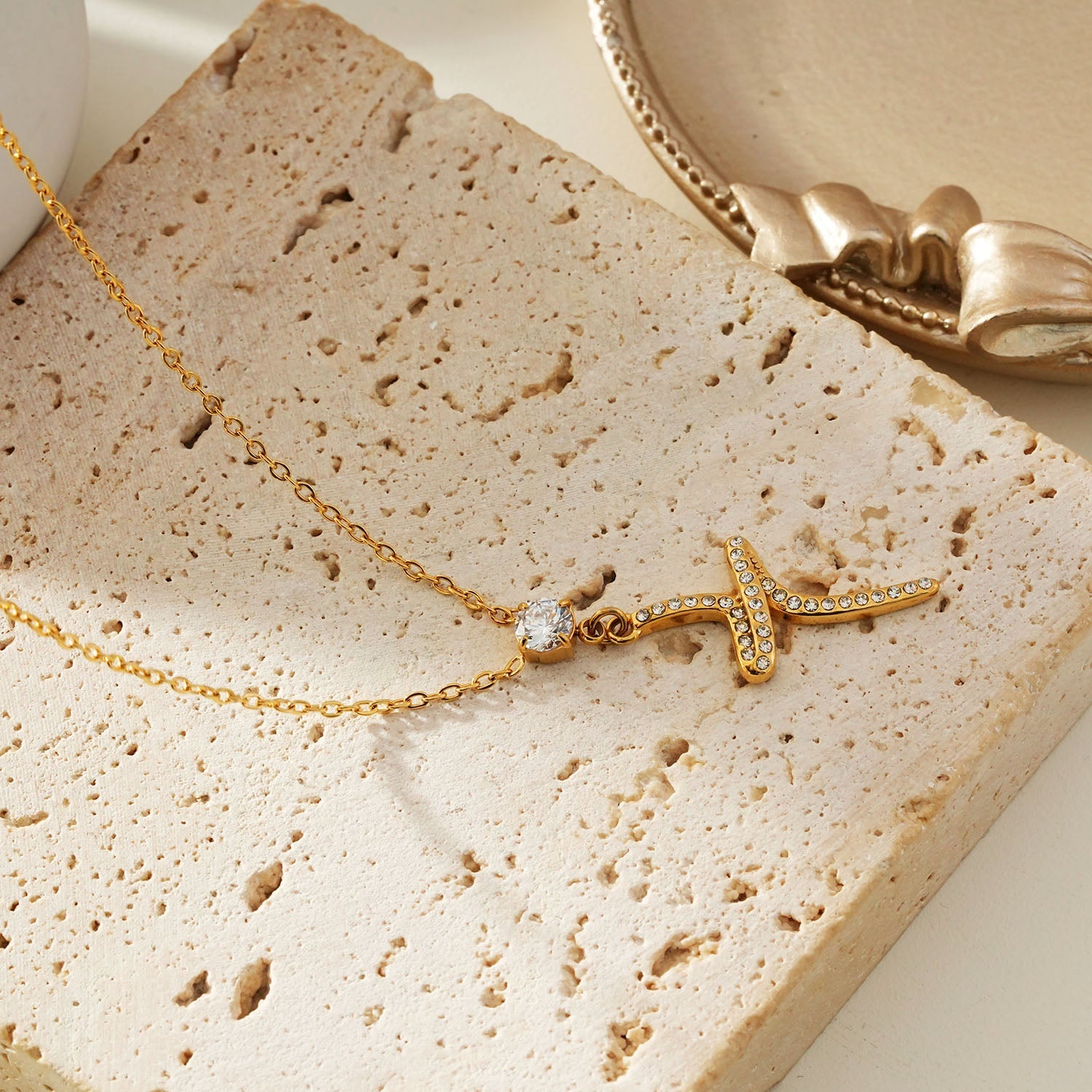 CRISTO Gold: Dainty Chain Necklace with a Zirconia Embedded Abstract Textured Cross Pendent