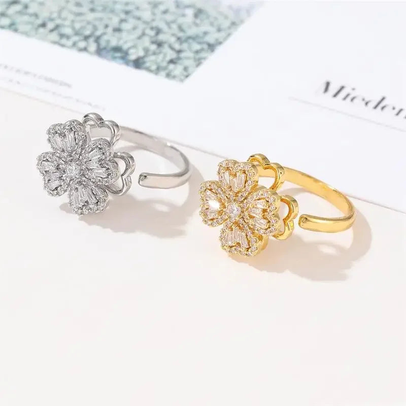 Bague de fleur en cristal de zircon rotative Haut de gamme Style simple et cool Classique à lumière ouverte Bague rétro de luxe Bague en trèfle à quatre feuilles