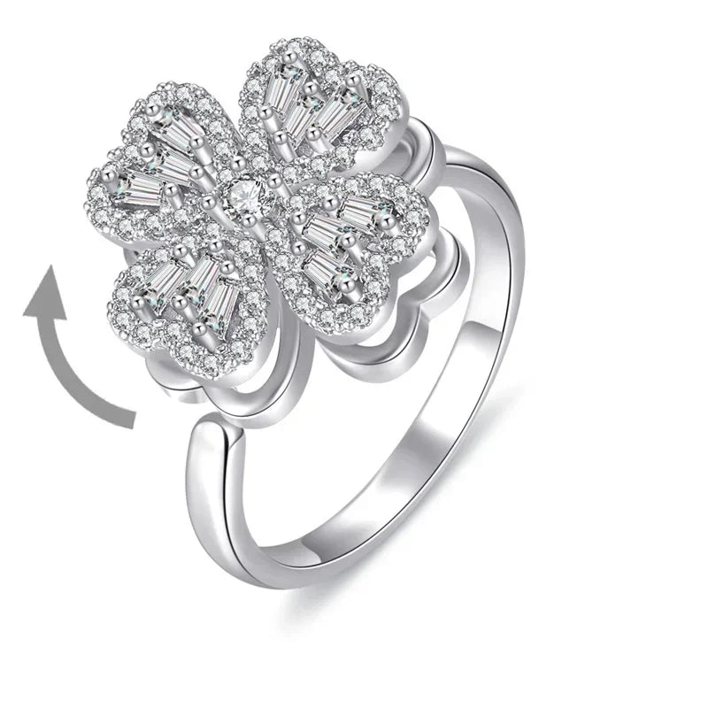 Bague de fleur en cristal de zircon rotative Haut de gamme Style simple et cool Classique à lumière ouverte Bague rétro de luxe Bague en trèfle à quatre feuilles